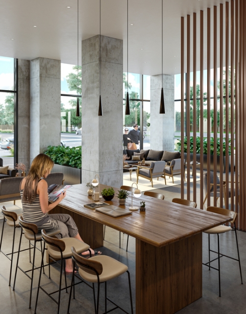 woman reading magazine sitting inside the building